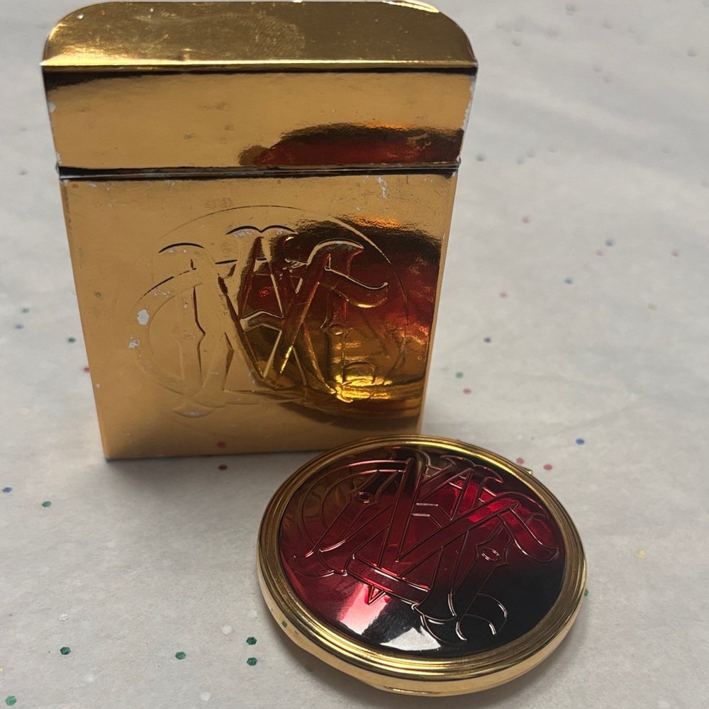 “Commemorate” Sheerspark pressed powder Compact. 
MAC